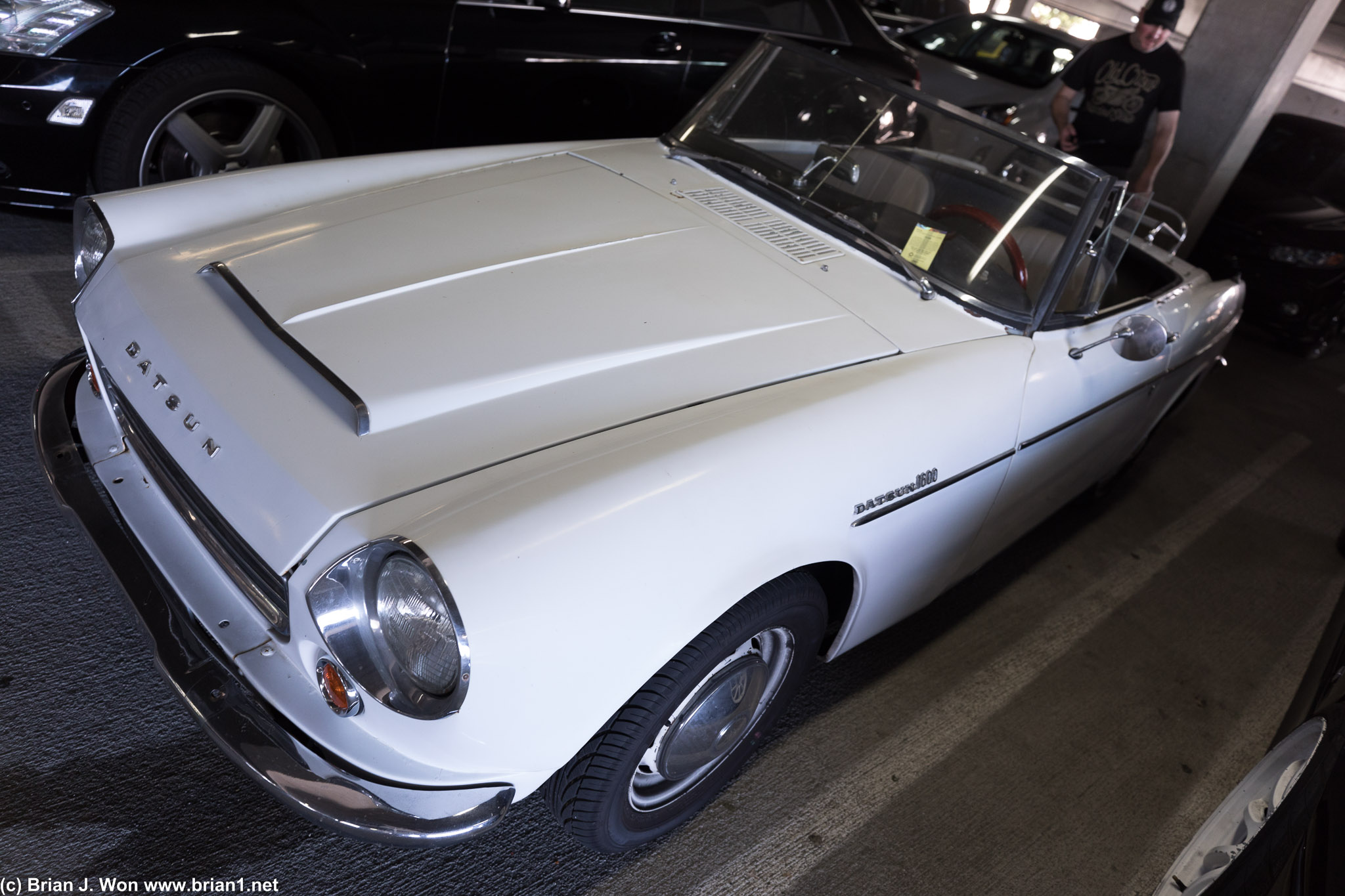 And a few more in the parking structure... Datsun Roadster.