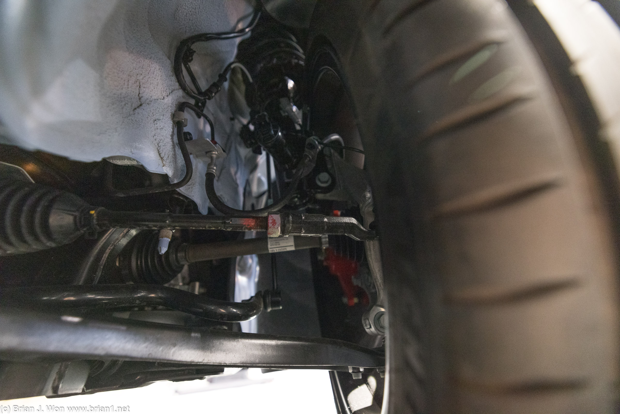 Hyundai Elantra N suspension details. Struts up front. Skinny looking CV joints.